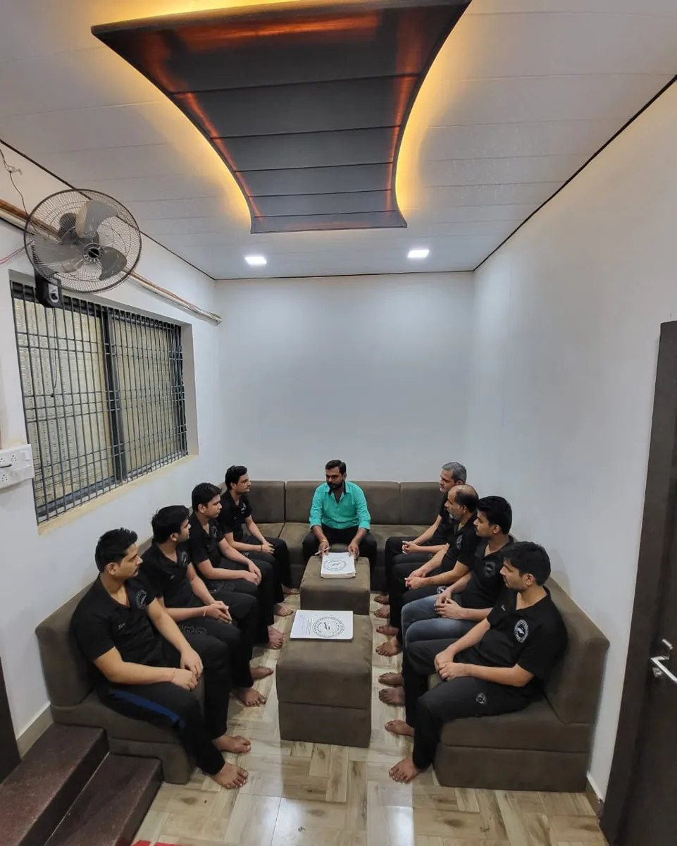 Group meeting image from the existing website